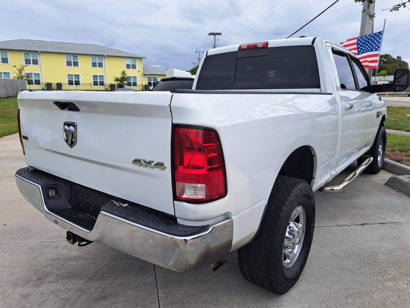 2011 White /BEIGE Dodge Ram 2500 Power Wagon Crew Cab 4WD (3D7UT2CL4BG) with an 6.7L L6 OHV 24V TURBO DIESEL engine, AUTOMATIC transmission, located at 1181 Aurora Rd, Melbourne, FL, 32935, (321) 241-1100, 28.132914, -80.639175 - Photo#1